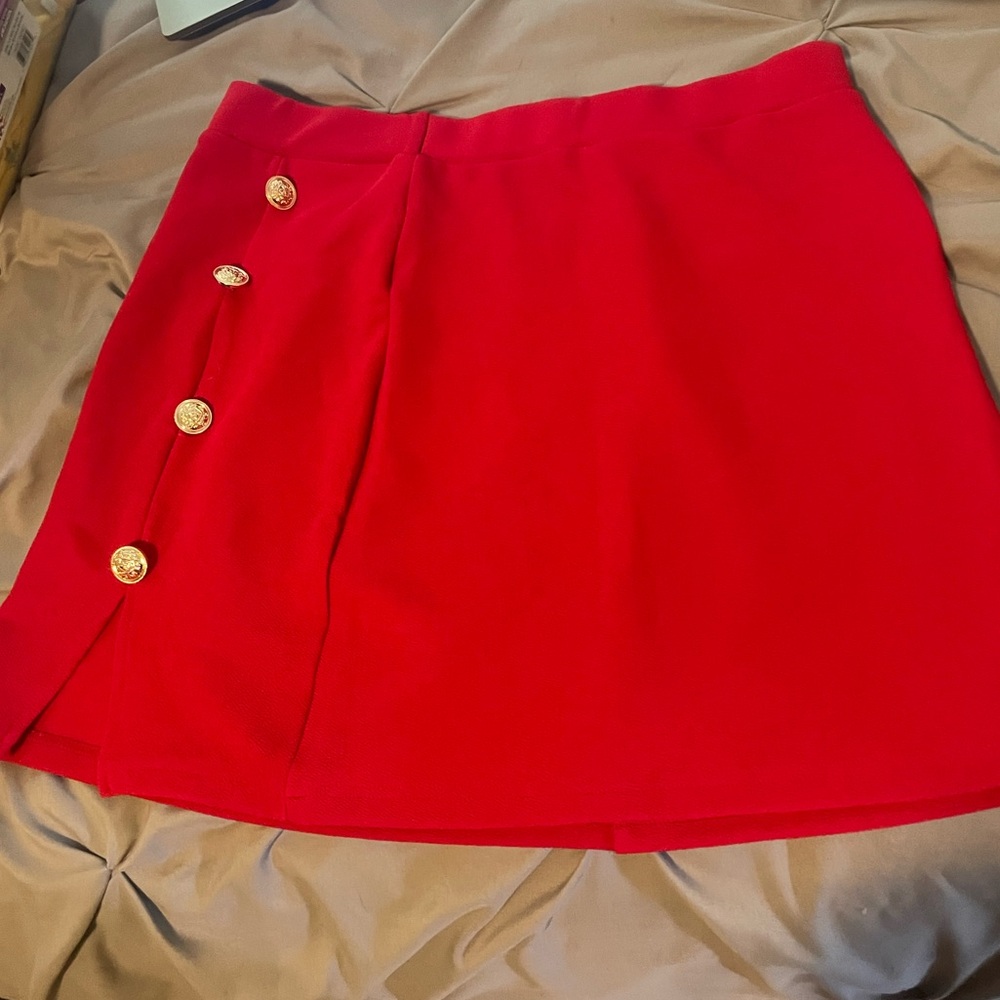 Red A Line dress with gold button accents